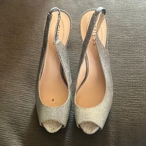 Like new, worn once silver guess heels